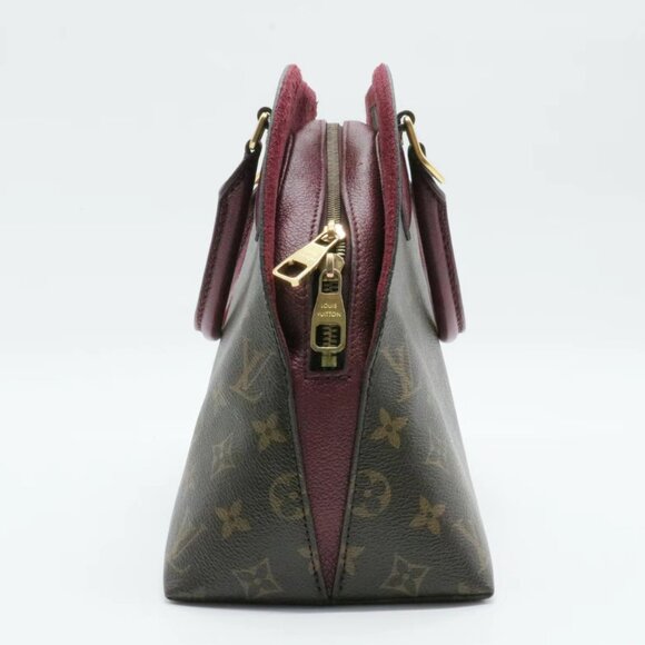 Louis Vuitton ALMA Handbag in Monogram Coated Canvas Brown Contrast Burgundy - Picture 6 of 11